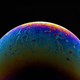 Illustration for article titled Photos of Soap Bubbles that Look Like Trippy Exoplanets